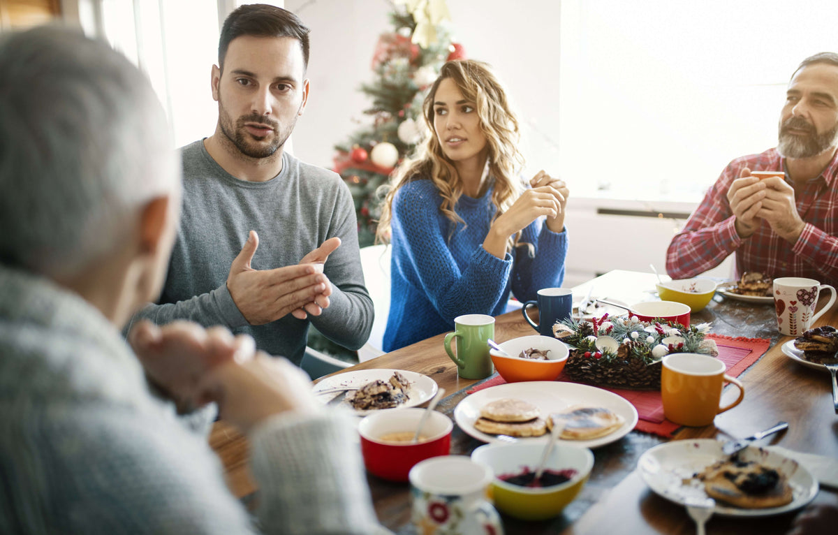 Family gathered around a table